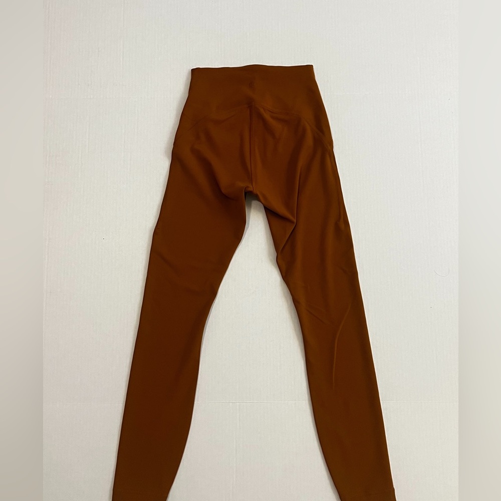burnt orange lululemon leggings, size 2